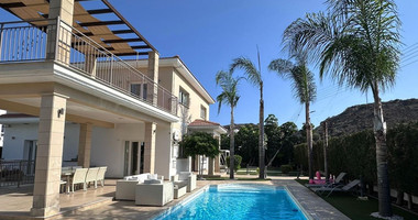 FOR RENT FURNISHED FIVE BEDROOM VILLA IN AGIOS TYCHONAS WITH ALL EN SUITE BEDROOMS , LARGE GARDEN, SWIMMING POOL