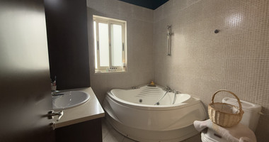 FOR RENT DETACHED FOUR BEDROOM HOUSE WITH SEPARATE OFFICE IN KATO POLEMIDIA OFFERING LANDSCAPED GARDEN AND SWIMMING POOL.