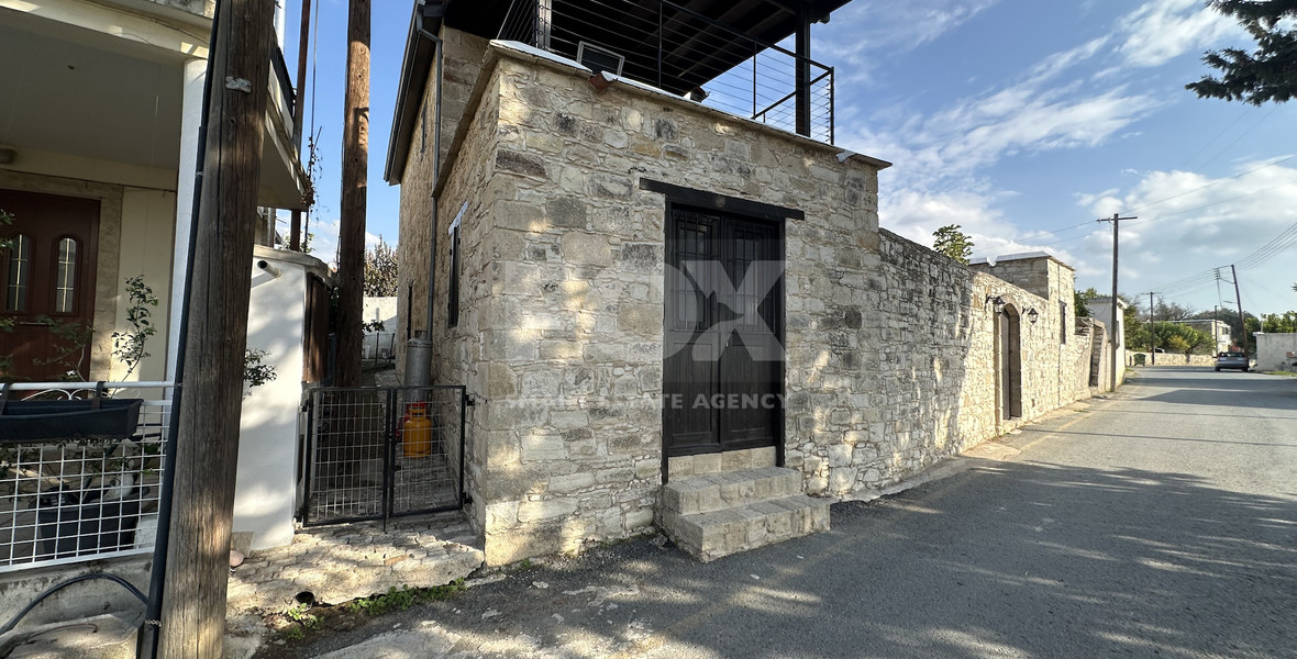 Two story house with an adjacent flat in Amargeti, Paphos