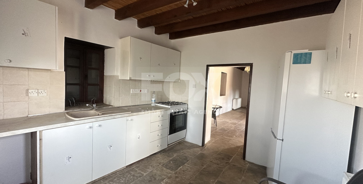 Two story house with an adjacent flat in Amargeti, Paphos