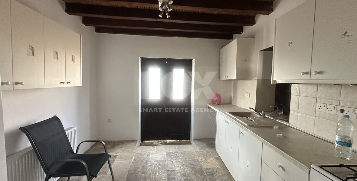 Two story house with an adjacent flat in Amargeti, Paphos