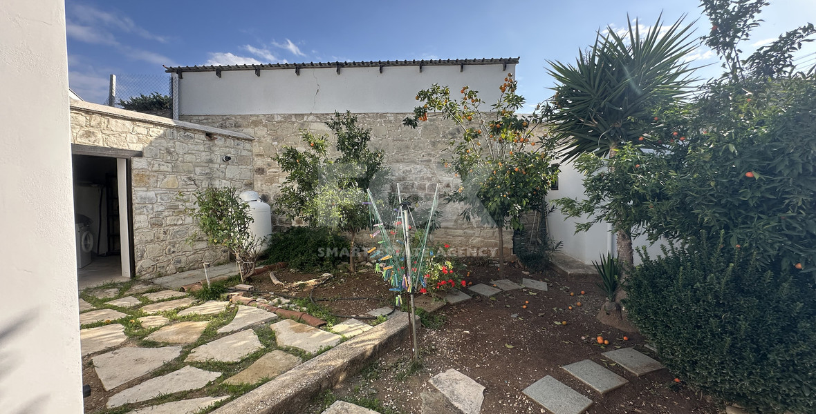 Two story house with an adjacent flat in Amargeti, Paphos