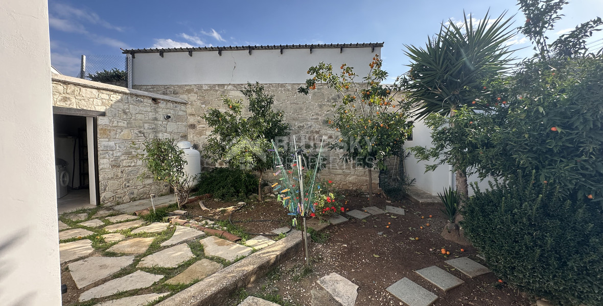 Two story house with an adjacent flat in Amargeti, Paphos