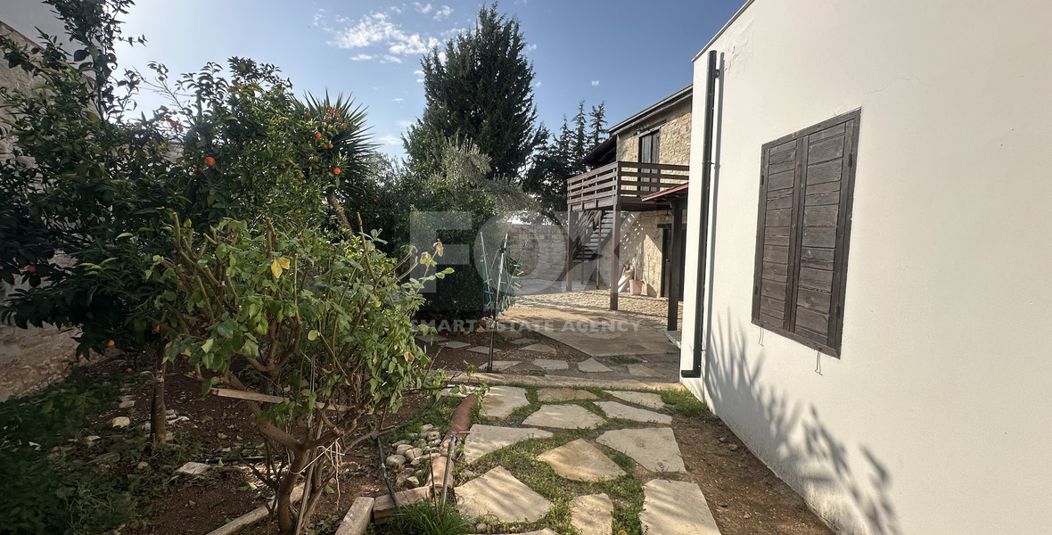 Two story house with an adjacent flat in Amargeti, Paphos