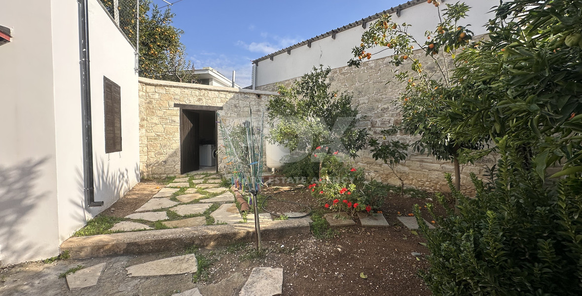 Two story house with an adjacent flat in Amargeti, Paphos