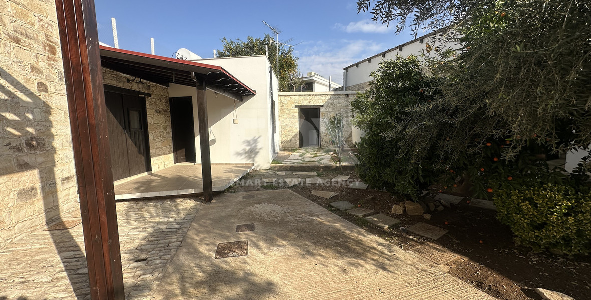 Two story house with an adjacent flat in Amargeti, Paphos