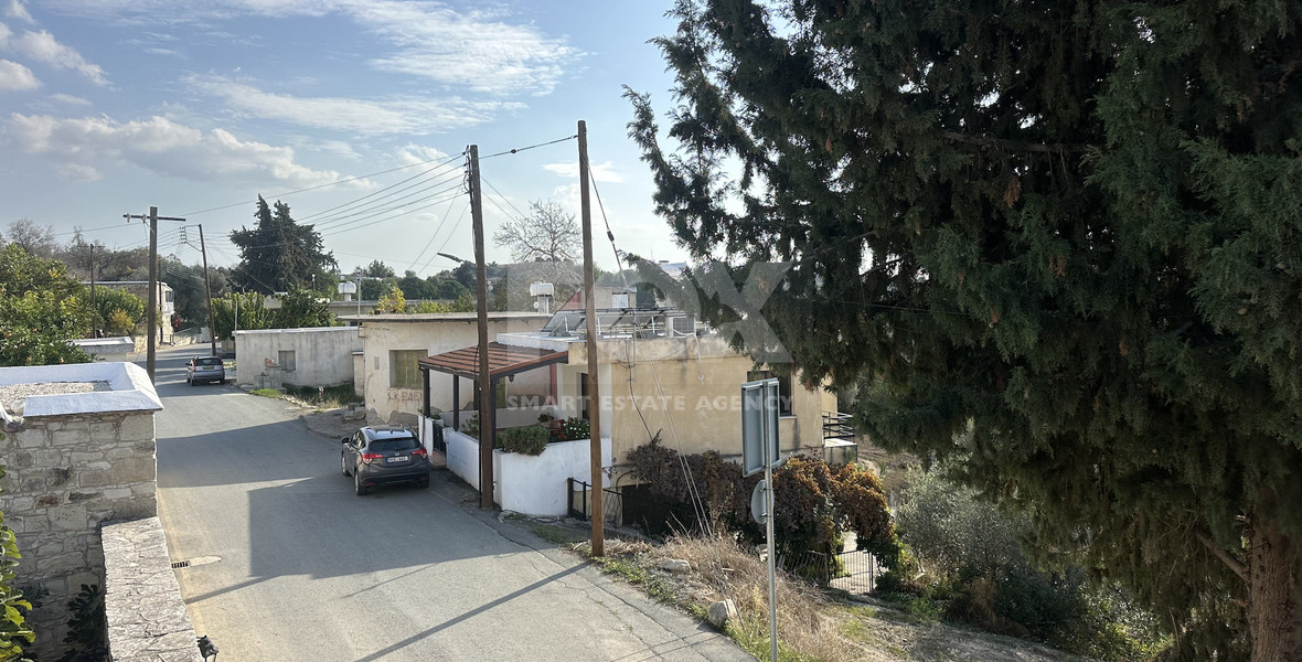 Two story house with an adjacent flat in Amargeti, Paphos