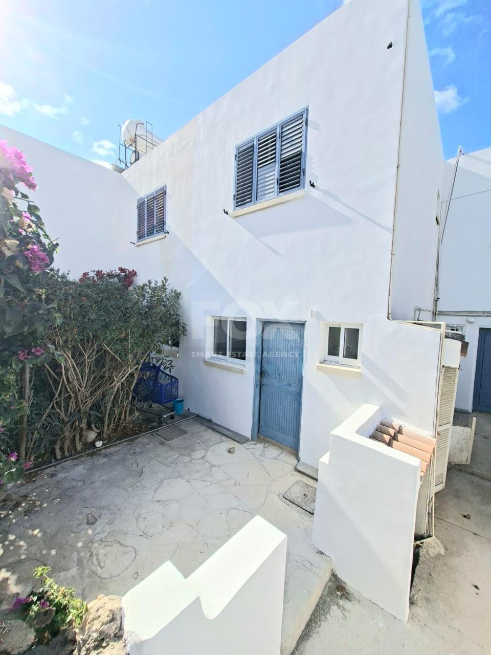 For sale : Two Bedroom Townhouse with Communal Pool Near Historic Paphos – Ideal Family Home or Investment