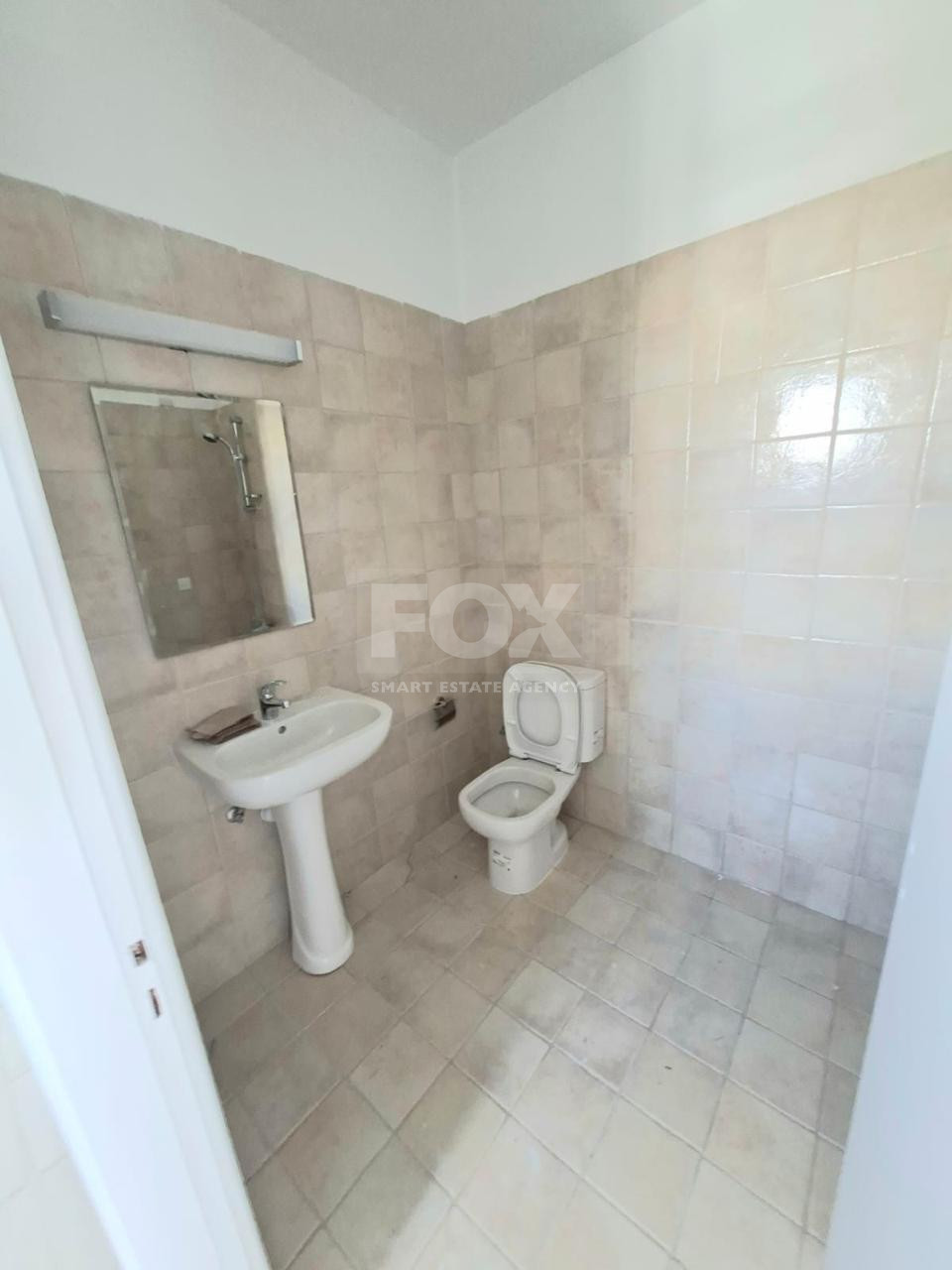 For sale : Two Bedroom Townhouse with Communal Pool Near Historic Paphos – Ideal Family Home or Investment