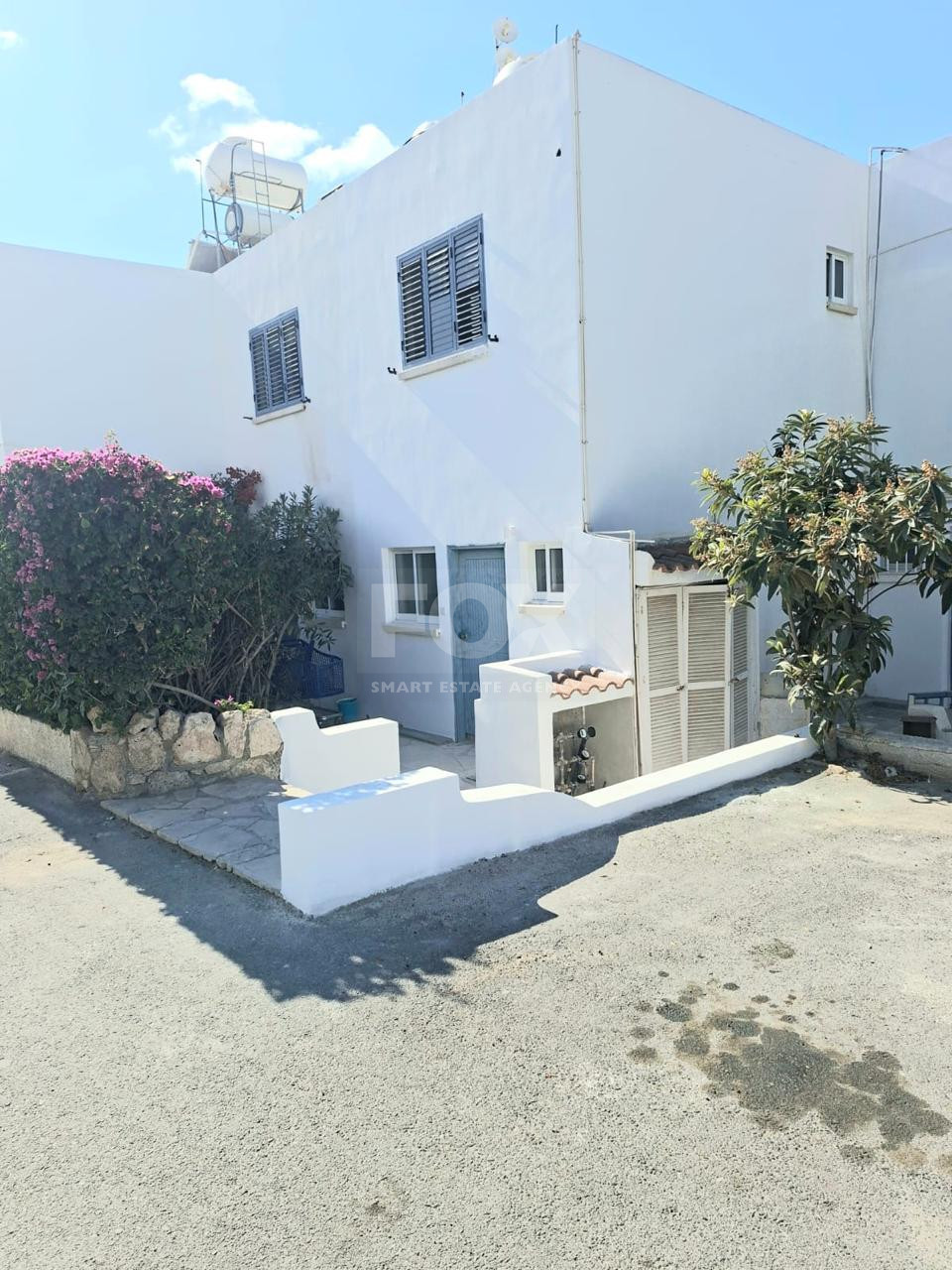 For sale : Two Bedroom Townhouse with Communal Pool Near Historic Paphos – Ideal Family Home or Investment