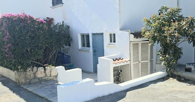 For sale : Two Bedroom Townhouse with Communal Pool Near Historic Paphos – Ideal Family Home or Investment