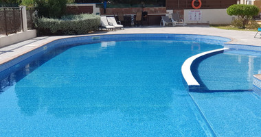 Modern two-bedroom Apartment for rent in Pissouri with Communal Pool and Sea View