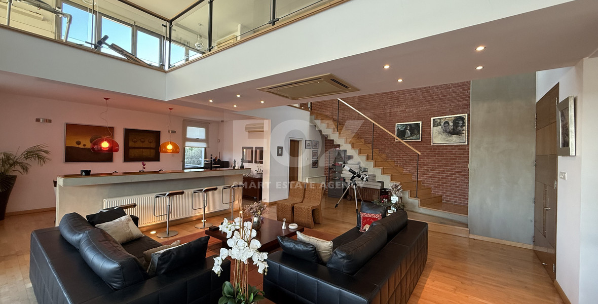 For Sale Elegant four-Bedroom Bespoke Residence in Agios Athanasios below the highway within walking distance to all amenities.