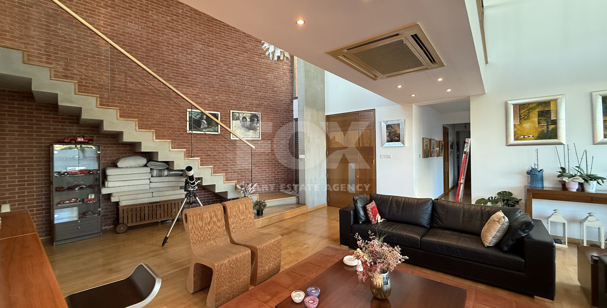 For Sale Elegant four-Bedroom Bespoke Residence in Agios Athanasios below the highway within walking distance to all amenities.