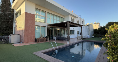 For Sale Elegant four-Bedroom Bespoke Residence in Agios Athanasios below the highway within walking distance to all amenities.