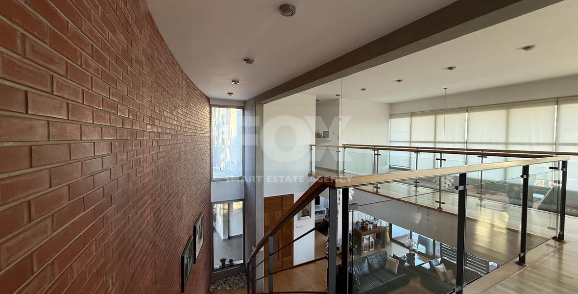 For Sale Elegant four-Bedroom Bespoke Residence in Agios Athanasios below the highway within walking distance to all amenities.