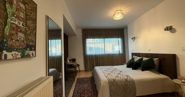 For Sale Elegant four-Bedroom Bespoke Residence in Agios Athanasios below the highway within walking distance to all amenities.