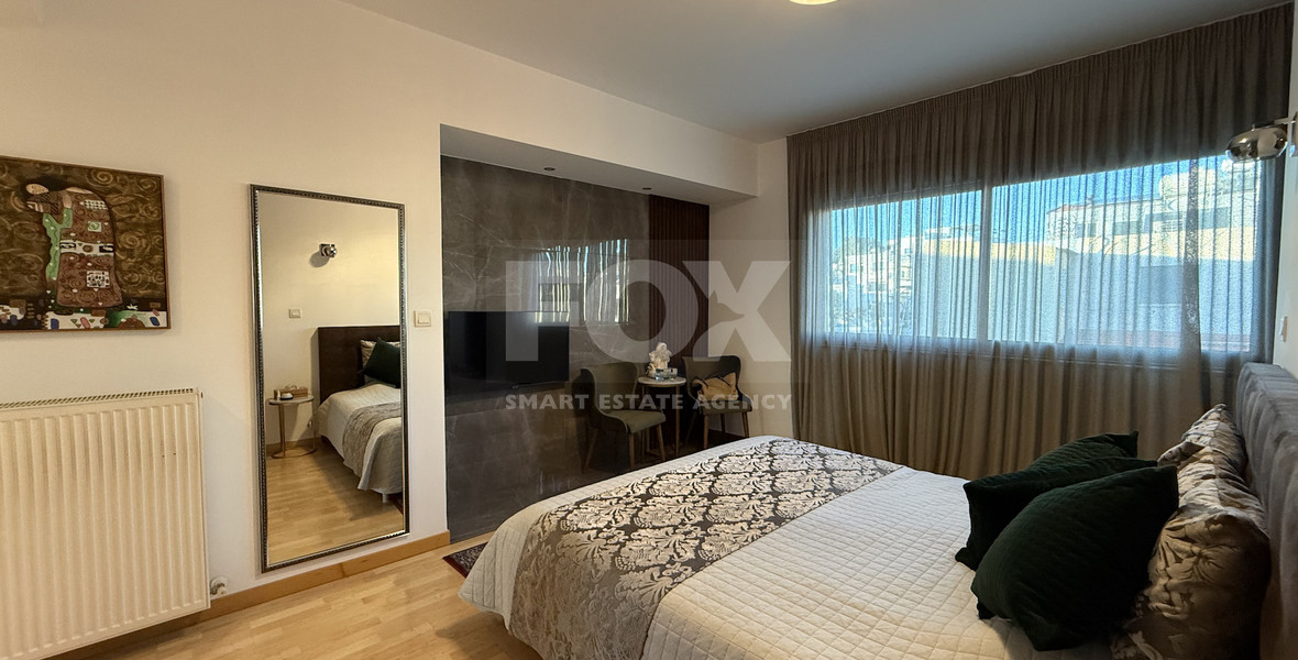 For Sale Elegant four-Bedroom Bespoke Residence in Agios Athanasios below the highway within walking distance to all amenities.