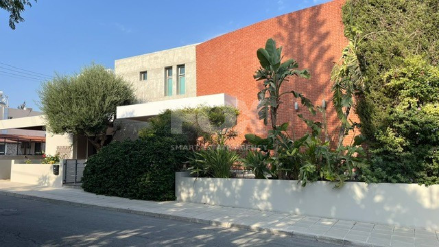 For Sale Elegant four-Bedroom Bespoke Residence in Agios Athanasios below the highway within walking distance to all amenities.