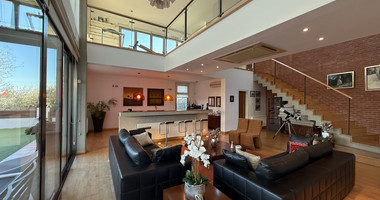 For Rent Elegant four-Bedroom Bespoke Residence in Agios Athanasios below the highway within walking distance to all amenities and easy access to schools.