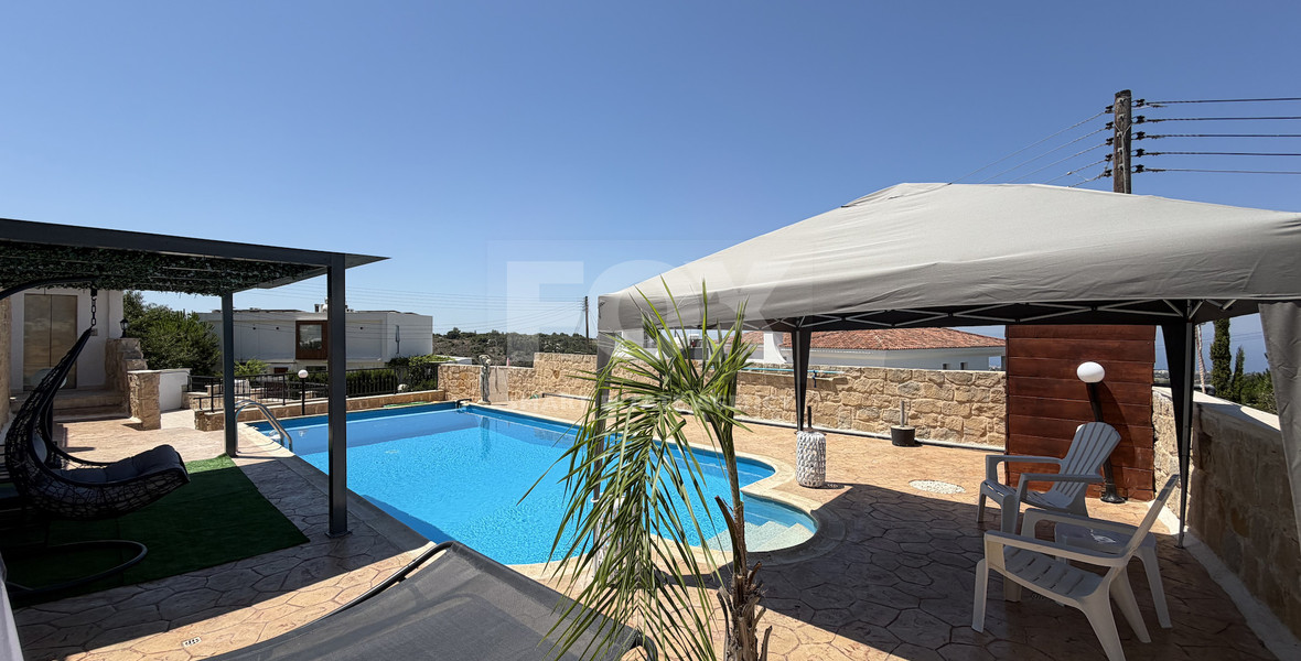 Luxury Detached four Bedroom House with unobstructed sea views and private swimming pool located in Tsada, Pafos for sale.