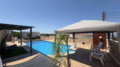 Luxury Detached four Bedroom House with unobstructed sea views and private swimming pool located in Tsada, Pafos for sale.