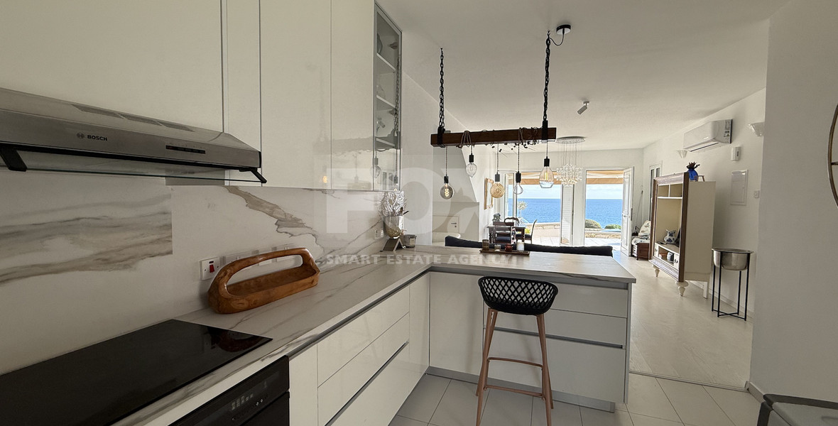 Rent: Renovated, fully furnished two bedroom ground floor apartment in the Amathusia area of Limassol, offering panoramic sea views.