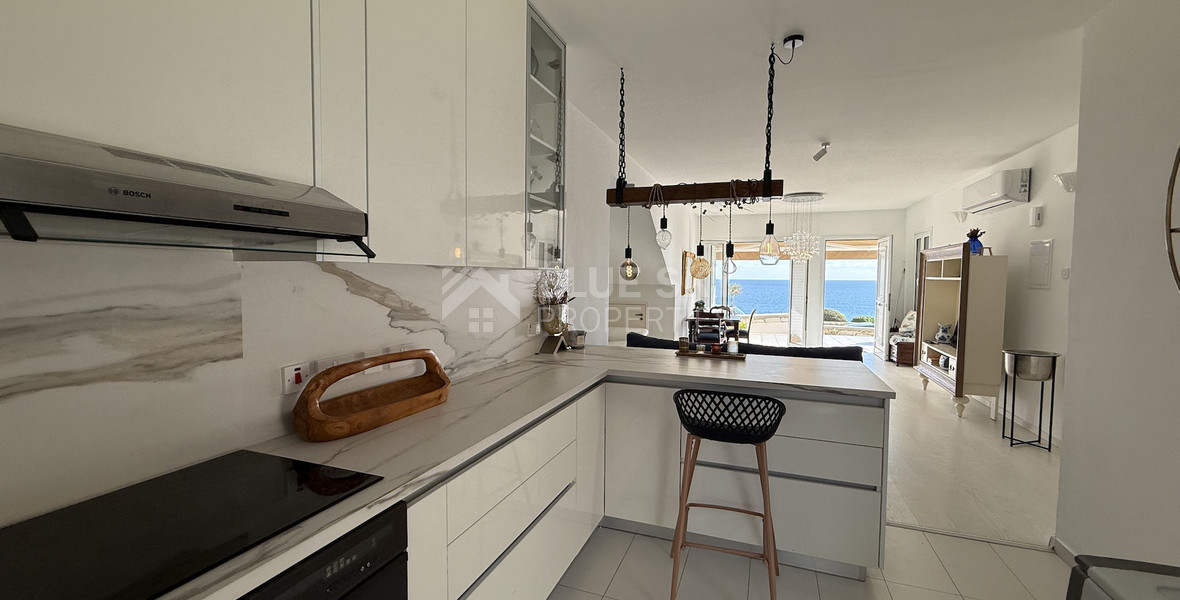 Rent: Renovated, fully furnished two bedroom ground floor apartment in the Amathusia area of Limassol, offering panoramic sea views.