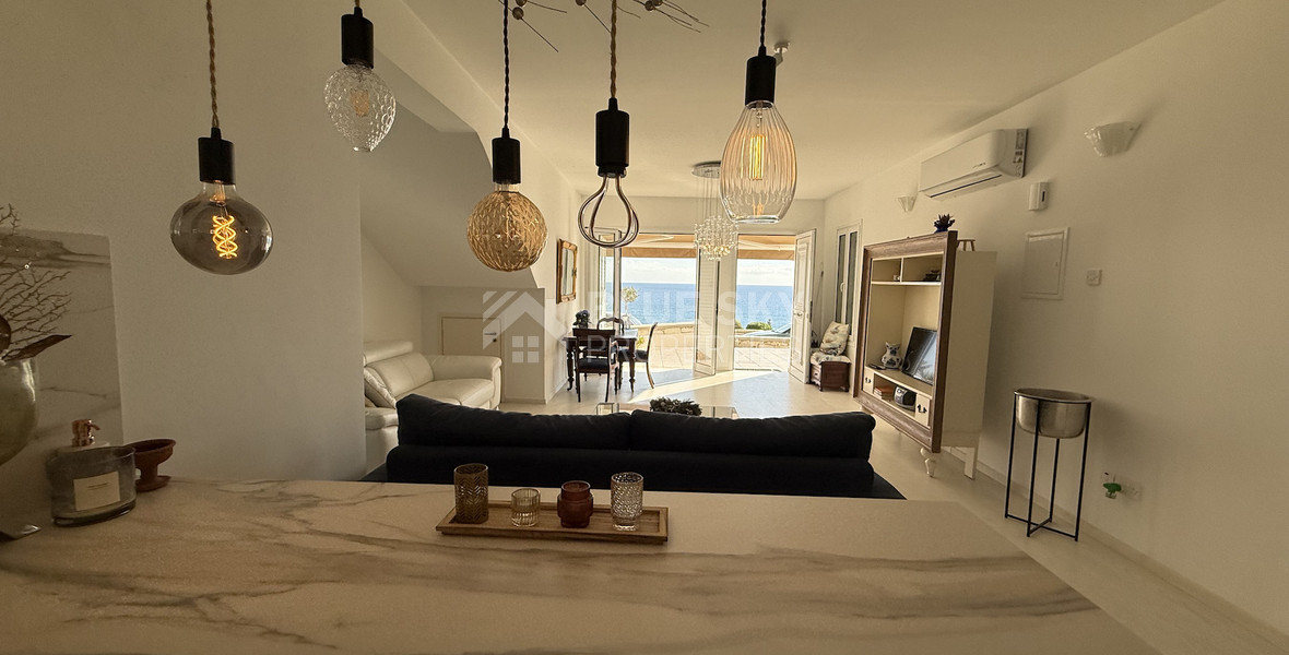 Rent: Renovated, fully furnished two bedroom ground floor apartment in the Amathusia area of Limassol, offering panoramic sea views.