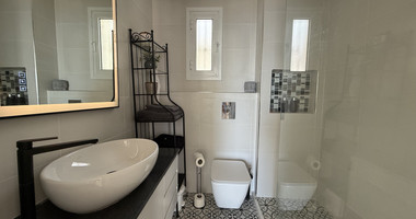 Rent: Renovated, fully furnished two bedroom ground floor apartment in the Amathusia area of Limassol, offering panoramic sea views.