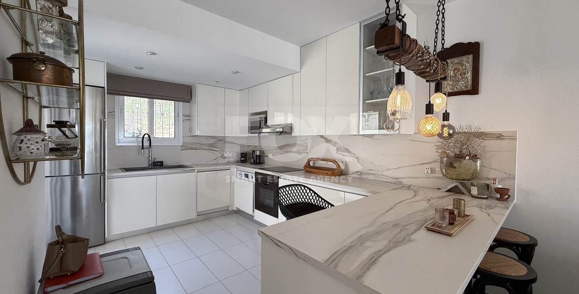 Rent: Renovated, fully furnished two bedroom ground floor apartment in the Amathusia area of Limassol, offering panoramic sea views.