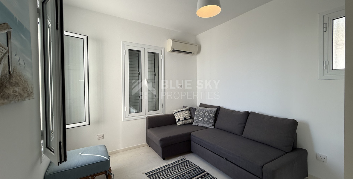 Rent: Renovated, fully furnished two bedroom ground floor apartment in the Amathusia area of Limassol, offering panoramic sea views.