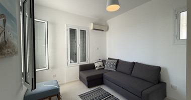 Rent: Renovated, fully furnished two bedroom ground floor apartment in the Amathusia area of Limassol, offering panoramic sea views.