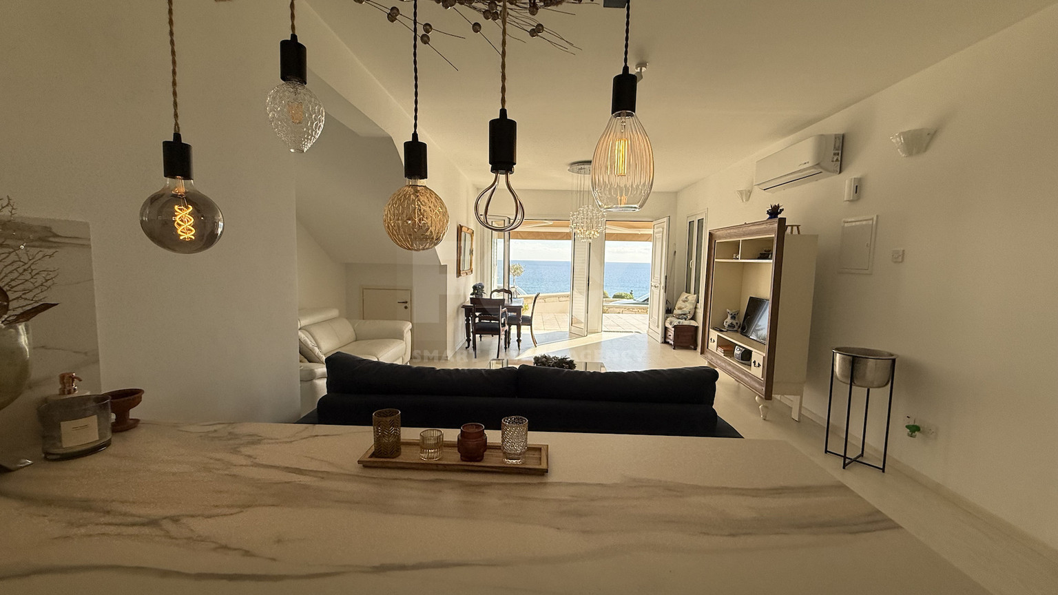 Rent: Renovated, fully furnished two bedroom ground floor apartment in the Amathusia area of Limassol, offering panoramic sea views.