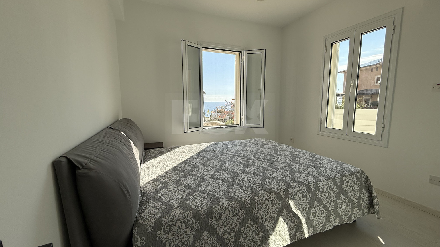 Rent: Renovated, fully furnished two bedroom ground floor apartment in the Amathusia area of Limassol, offering panoramic sea views.