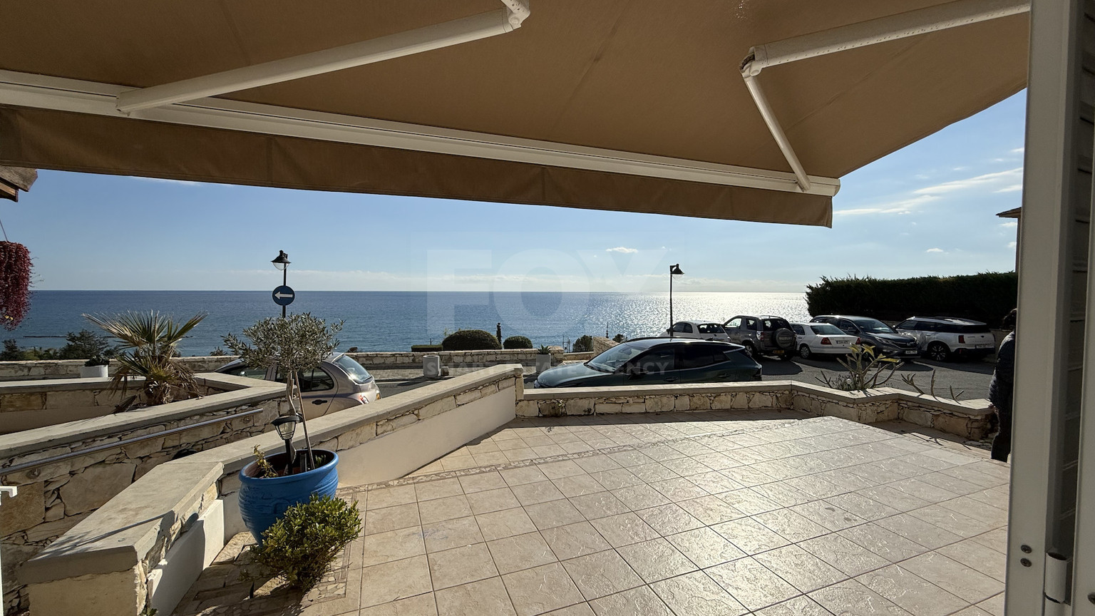 Rent: Renovated, fully furnished two bedroom ground floor apartment in the Amathusia area of Limassol, offering panoramic sea views.
