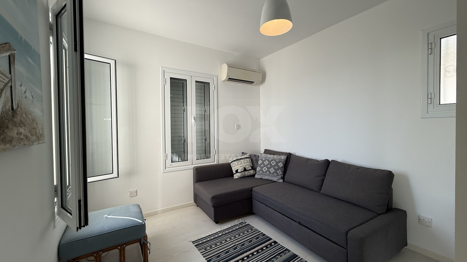 Rent: Renovated, fully furnished two bedroom ground floor apartment in the Amathusia area of Limassol, offering panoramic sea views.