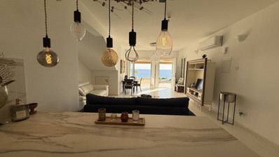 Rent: Renovated, fully furnished two bedroom ground floor apartment in the Amathusia area of Limassol, offering panoramic sea views.
