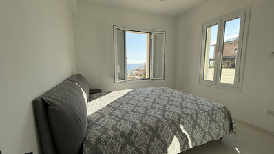 Rent: Renovated, fully furnished two bedroom ground floor apartment in the Amathusia area of Limassol, offering panoramic sea views.