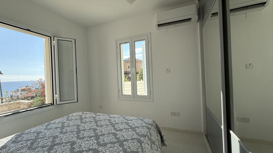 Rent: Renovated, fully furnished two bedroom ground floor apartment in the Amathusia area of Limassol, offering panoramic sea views.