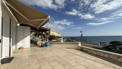 Rent: Renovated, fully furnished two bedroom ground floor apartment in the Amathusia area of Limassol, offering panoramic sea views.