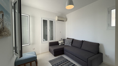 Rent: Renovated, fully furnished two bedroom ground floor apartment in the Amathusia area of Limassol, offering panoramic sea views.