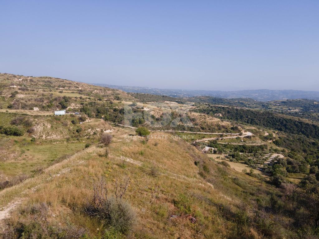 Field with Residential & Agricultural Zoning – Development Opportunity in a Scenic Community