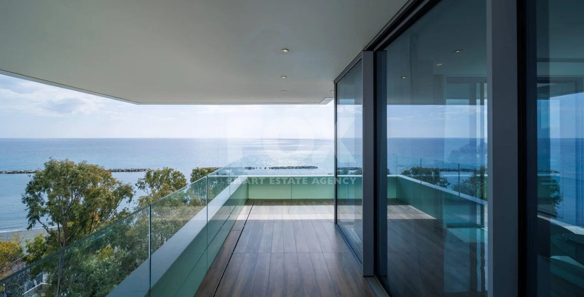 Exclusive Beachfront Living in Agios Tychonas – Four-Bedroom Full-Floor Apartment