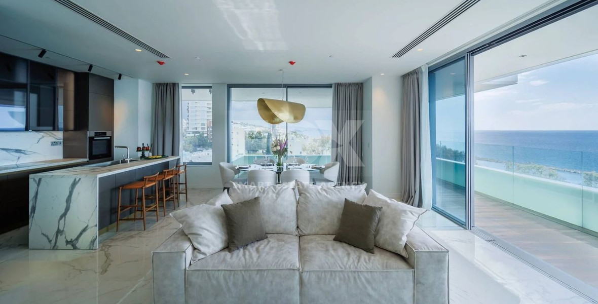 Exclusive Beachfront Living in Agios Tychonas – Four-Bedroom Full-Floor Apartment