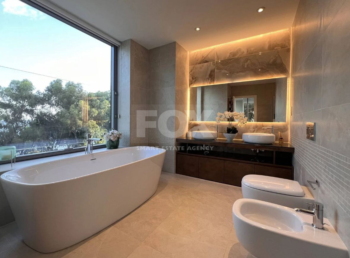 Exclusive Beachfront Living in Agios Tychonas – Four-Bedroom Full-Floor Apartment