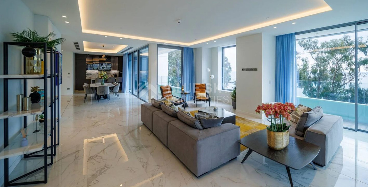 Exclusive Beachfront Living in Agios Tychonas – Four-Bedroom Full-Floor Apartment