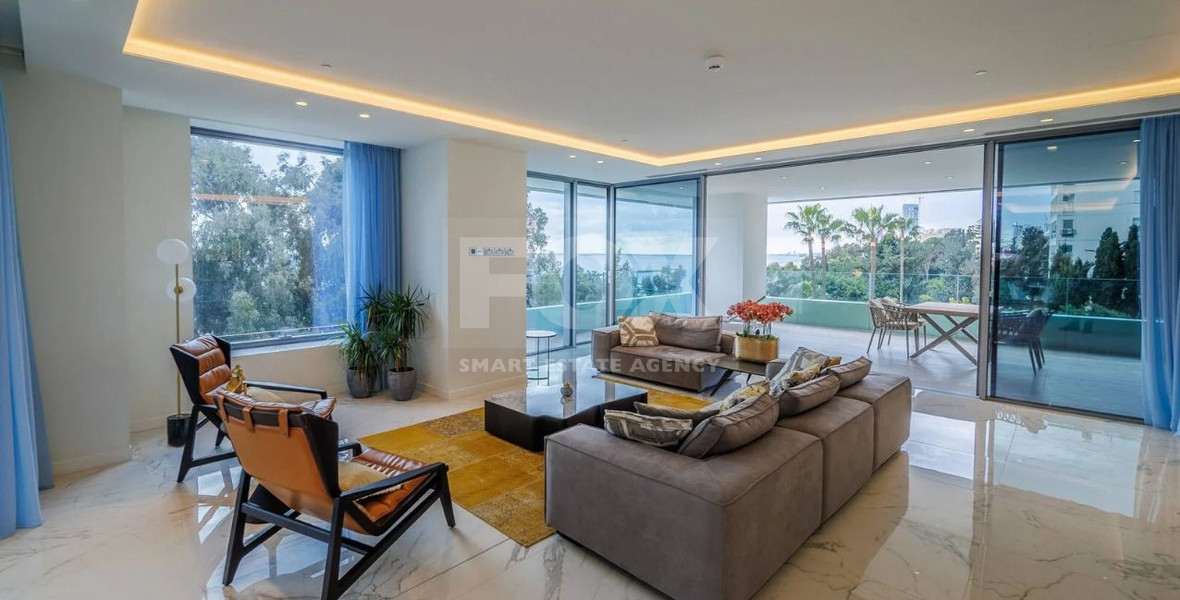 Exclusive Beachfront Living in Agios Tychonas – Four-Bedroom Full-Floor Apartment