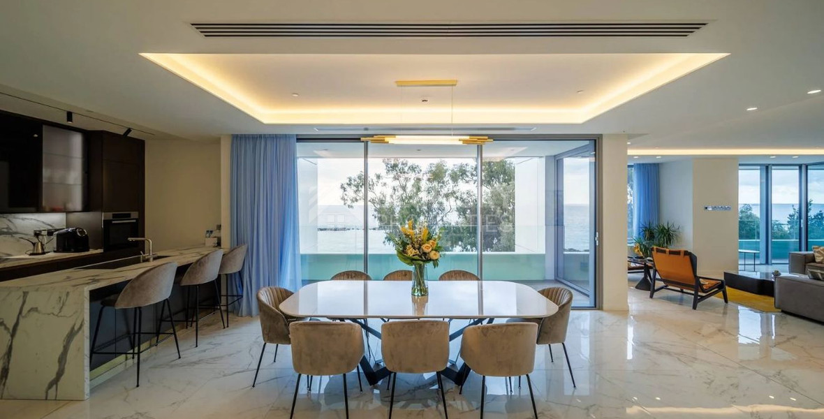 Exclusive Beachfront Living in Agios Tychonas – Four-Bedroom Full-Floor Apartment