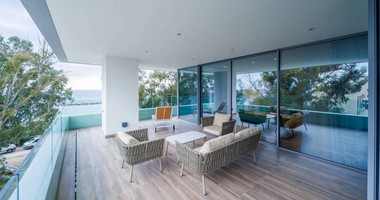 Exclusive Beachfront Living in Agios Tychonas – Four-Bedroom Full-Floor Apartment